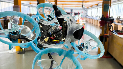 Drone flying through workshop