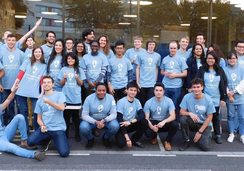 engineering students in blue t shirts